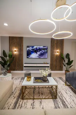 a living room with a couch and a coffee table at Stunning Luxury 9BR Encore Villa by Disney in Orlando