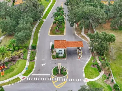 an aerial view of a road with a house at Tranquility Hut, Spacious 4-bedrooms, 4-bathrooms, Pools, free parking in Kissimmee