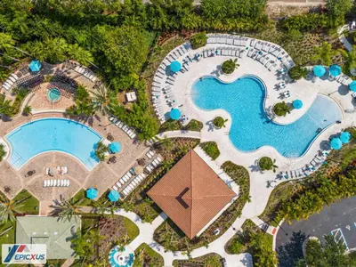 an overhead view of a pool at a resort at The Epic Edinburgh Top Floor Vista Cay Orlando in Orlando