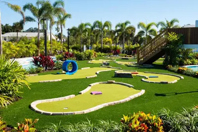 a park with a golf course in the grass at Kompose Boutique Resort @ Theme Parks in Kissimmee