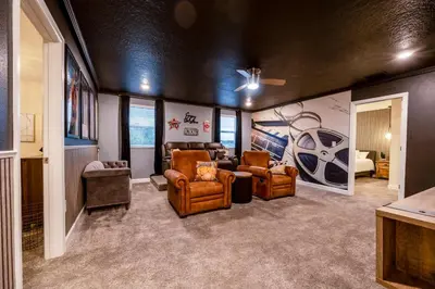 a living room with couches and chairs in a room at Incredible 6BR Villa by Disney Private Pool Games in Kissimmee