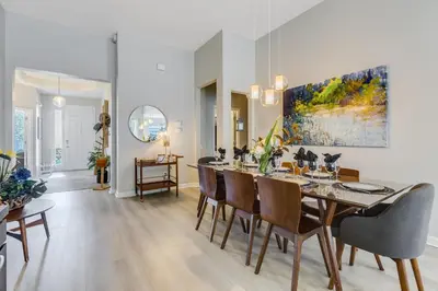 a dining room with a table and chairs at Hibiscus Villa in Orlando
