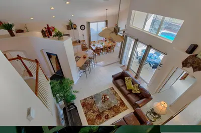 an overhead view of a living room and dining room at Resort 5 Bed Private Pool & Spa, Game Room Home in Kissimmee
