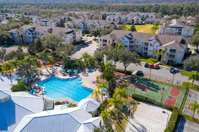 an aerial view of a pool at a resort at Four Bedroom/3 Bath South Facing Pool/Spa Villa in Kissimmee