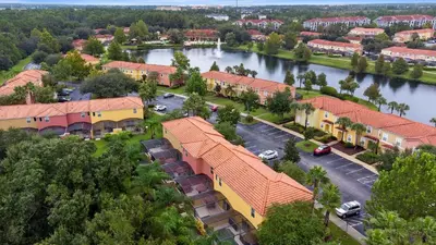 an aerial view of a town with a river at Amazing Townhouse close to Disney 2 Bed 2.5 Bath in Kissimmee