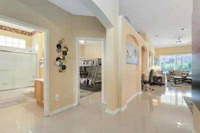 a large room with a living room and a dining room at Amazing Disney Dream Getaway in Windsor Palms! in Kissimmee