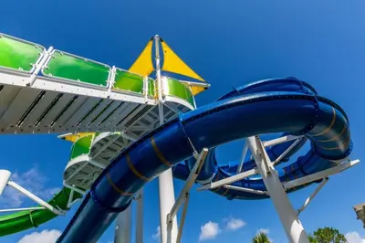 a blue water slide at a theme park at Three BR * 2 Miles to Disney, pool, free WiFi in Orlando