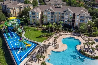 an aerial view of a water park at a resort at Three BR * 2 Miles to Disney, pool, free WiFi in Orlando