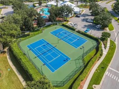 an overhead view of two tennis courts at Making Memories Resort Windsor Palms Condo in Kissimmee