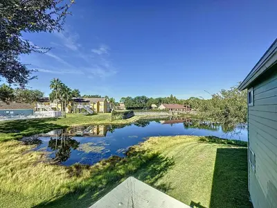 a view of a river from the side of a house at Lovely 3 bed Condo Near Disney Quiet Community in Kissimmee