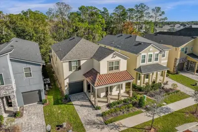an aerial view of a row of houses at 6 Bedrooms 5 Bathrooms Solara 1889 Tp in Orlando
