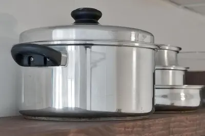 a slow cooker sitting on top of a counter at Enclave Refurbished Condo: Just 2mi to Universal! in Orlando