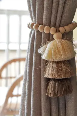 a curtain with a bunch of tassels on it at Remodeled Retreat: Tranquil Resort Oasis Near Theme Parks in Kissimmee