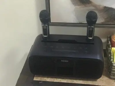 two microphones sitting on top of a computer monitor at House of Blues-3 Bedrooms+GameRoom in Orlando