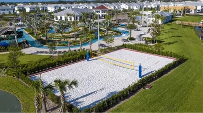an aerial view of a pool at a resort at 4BR Pool Home w Free Waterpark - 9 Min to Disney in Kissimmee
