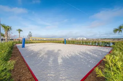 a playground with a red and blue at 2984JP TOWNHOUSE 4 BEDROOMS & 3 BATHROOMS + POOL in Kissimmee