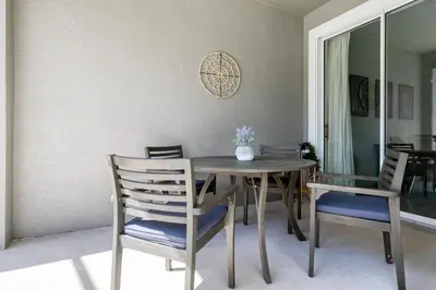 a dining room with a wooden table and chairs at Last Minute Disney Getaway Private Pool Themed Bedrooms. Book Now 56757 in Kissimmee