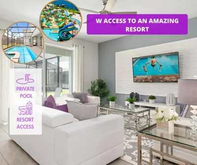 a living room with a white couch and a tv at Relax & Unwind Chic Pool Home Near Disney Fun! - STL113 in Kissimmee