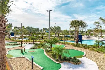 a golf course at a resort with a putting green at Home away from Home! 6BR, 5.5 BA - STL118 in Kissimmee