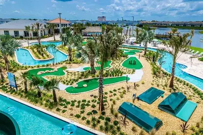 an aerial view of a resort with a golf course at Lovely Family Home - 8 Min to Disney! - STL106 in Kissimmee