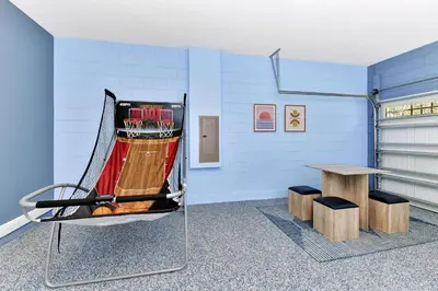 a room with a ping pong racket on a table at Glorious Home Near Disney With Private Pool, Game Room And Waterpark & Resort Access At Encore Resorts Reunion - 660La in Kissimmee