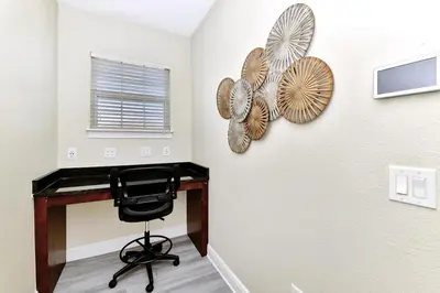 a home office with a desk and a chair at Gorgeous Home With Private Pool, Game Room Near Disney With Waterpark & Resort Access At Encore Resort - 781La in Kissimmee