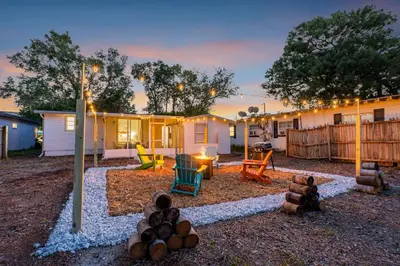 a yard with a playground and a house at Fire Pit + Grill + 2MI to DT Orlando in Orlando