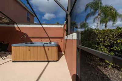a bath tub sitting on the side of a building at Amazing Townhouse for 6 people near Disney in Kissimmee
