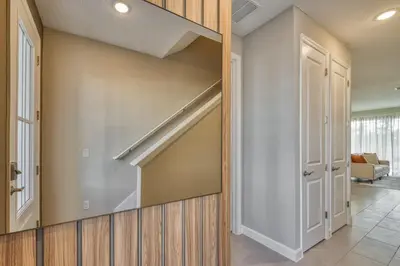 a hallway with a built in closet in a house at Last Minute Disney Getaway Private Pool Themed Bedrooms. Book Now 81923 in Orlando