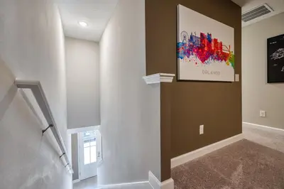 a hallway of a home with a painting on the wall at Last Minute Disney Getaway Private Pool Themed Bedrooms. Book Now 81919 in Orlando