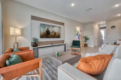 a living room with two couches and a table at Last Minute Disney Getaway Private Pool Themed Bedrooms. Book Now 81921 in Orlando