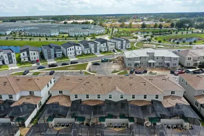 an aerial view of a town with houses at Last Minute Disney Getaway Private Pool Themed Bedrooms. Book Now 93749 in Kissimmee