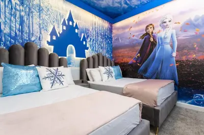 a bedroom with two beds and a disney mural at Last Minute Disney Getaway Private Pool Themed Bedrooms. Book Now 99589 in Kissimmee