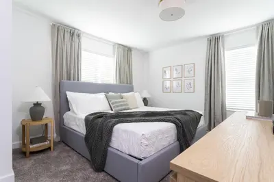 a bedroom with a bed with a blanket on it at Last Minute Disney Getaway Private Pool Themed Bedrooms. Book Now 99589 in Kissimmee