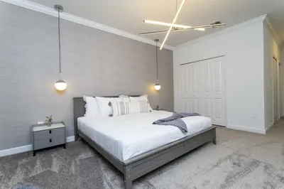 a bedroom with a bed and a ceiling fan at Storey Lake Resort 1086 - Hosted by Top Villas in Kissimmee
