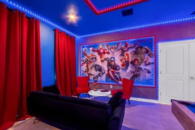 a living room with a couch and red curtains at Storey Lake Resort 1095 - Hosted by Top Villas in Kissimmee