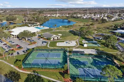 an overhead view of a tennis court and a tennis court at Disney and Airport 15 minutes from Luxury Condo in Orlando