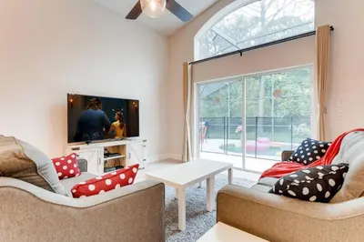 a living room with two couches and a tv at H8438S Emerald Island Resort One Level POOL Pet OK in Kissimmee
