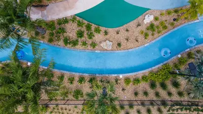 an aerial view of the pool at the resort at Amazing house near the parks in Kissimmee