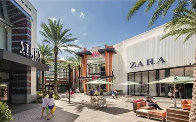 a rendering of a shopping mall with people walking around at Bposhtels Orlando Disney in Kissimmee