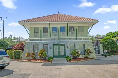 a large building with a roof on top of it at Summer Deal - Relax & Unwind, Townhome by Disney! in Orlando