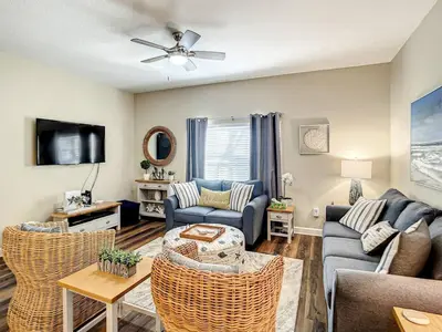 a living room with a couch and chairs at Paradise Palms Resort Townhome Close to Disney in Kissimmee