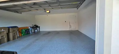 an empty room with a white wall and a door at Resort-Style Home in gated community with ammenities close to MCO and Parks! in Kissimmee