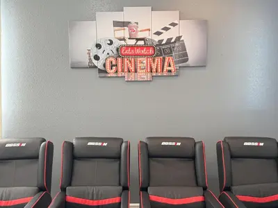 a waiting room with chairs and a sign on the wall at 7491 Oasis at Reunion sleeps 12 in Orlando