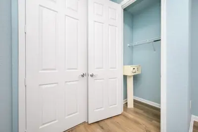 a white closet with a white door in a bathroom at Epic Universe New Beautiful Lakeview Condo Near The Parks - 1026 in Orlando