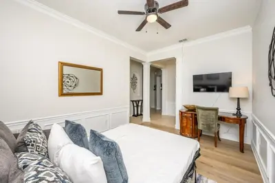 a living room with a couch and a ceiling fan at Epic Universe Penthouse Vacation Condo, Near The Parks - 2014 in Orlando