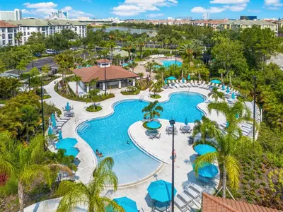 an aerial view of the pool at the resort at New Listing, Beautiful Townhome, Vista Cay - 4014 in Orlando
