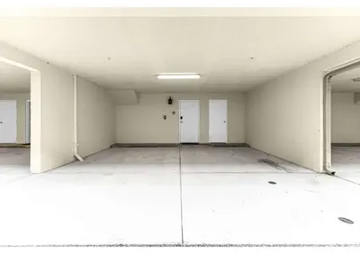 an empty room with white walls and white doors at Summer Days Fun - Renovated TownHome by Disney! in Orlando
