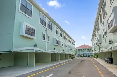 an empty street in front of a building at Book Your Summer Escape - TownHome by Disney! in Orlando
