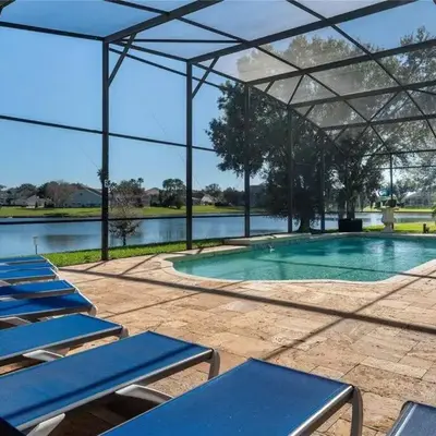 Mickeys Waterside - Gorgeous Waterside Southeast Facing 9BR Pool & Hot Tub BBQ Cinema RM 2 miles to Disney